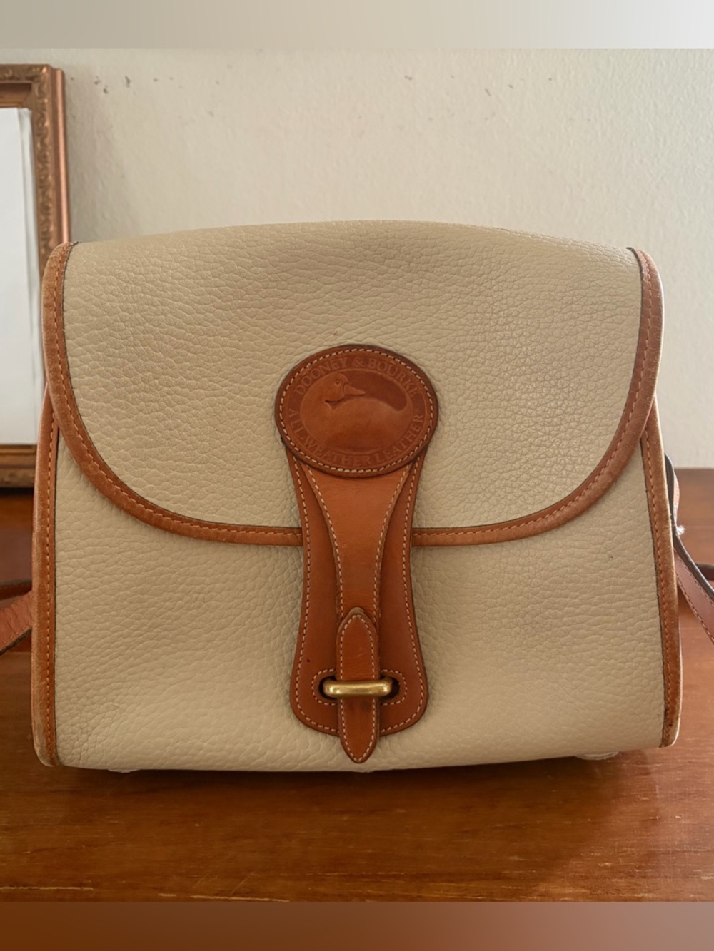 Dooney & Bourke Cream Pebble Leather Crossbody with Tan Trim